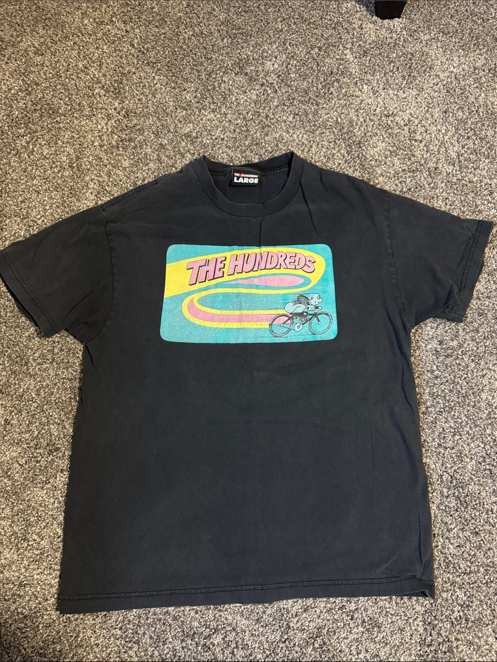 The Hundreds Black Tee with Teal, Yellow & Pink Retro Bike Graphic